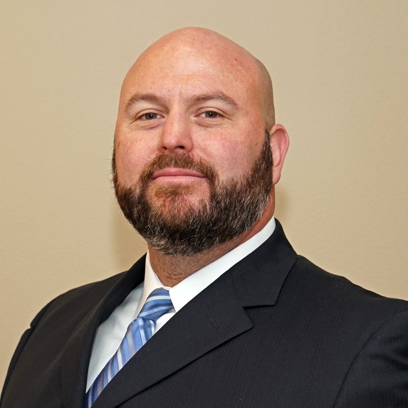 Portrait of Hamilton Allman, CPA, partner and Director of Tax Services at Allman & Allman